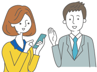 携帯を扱うお客さまにスーツの男性が説明をしているイメージ